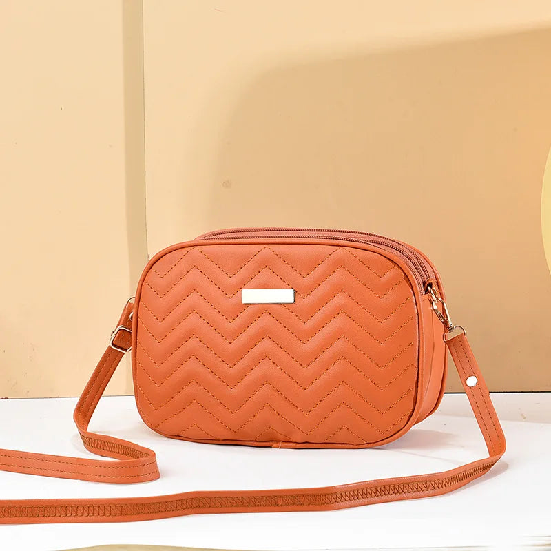 Sophia - Schwarze Chevron-Umhängetasche