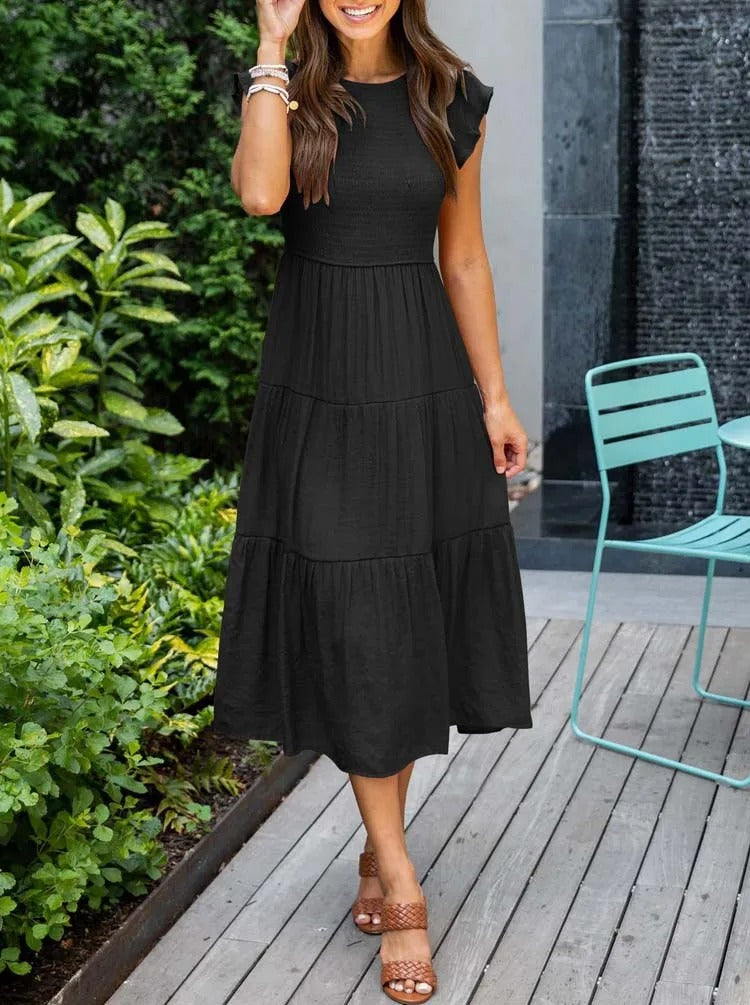 Elegantes sommerkleid: rüschendetails, taschen