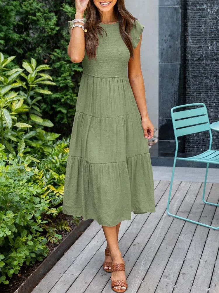 Elegantes sommerkleid: rüschendetails, taschen