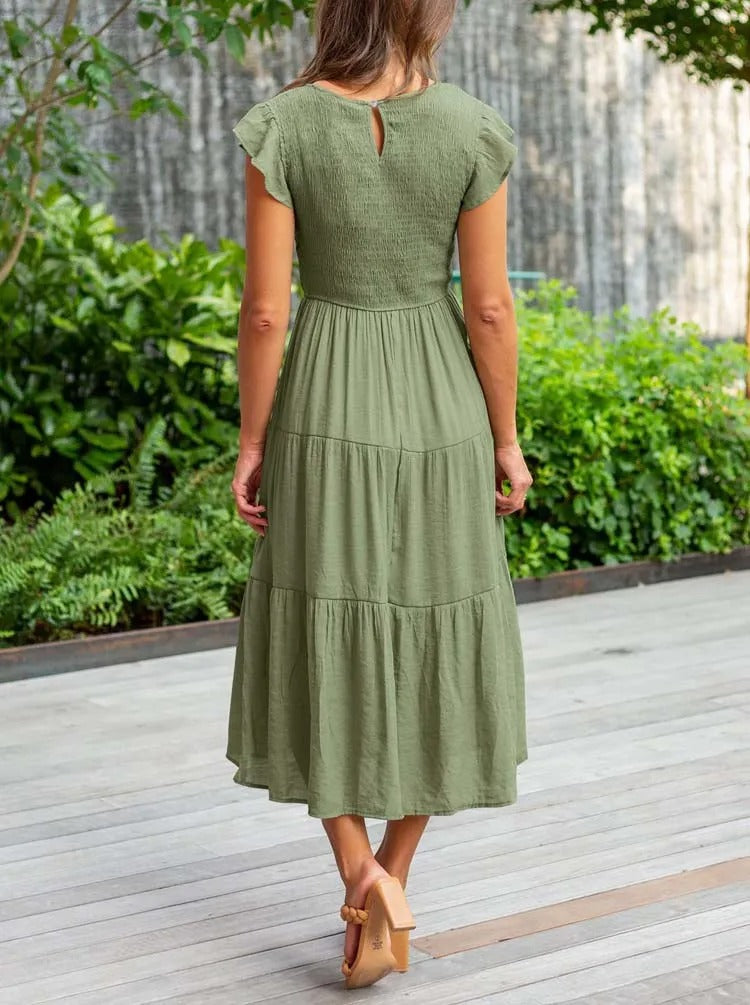 Elegantes sommerkleid: rüschendetails, taschen