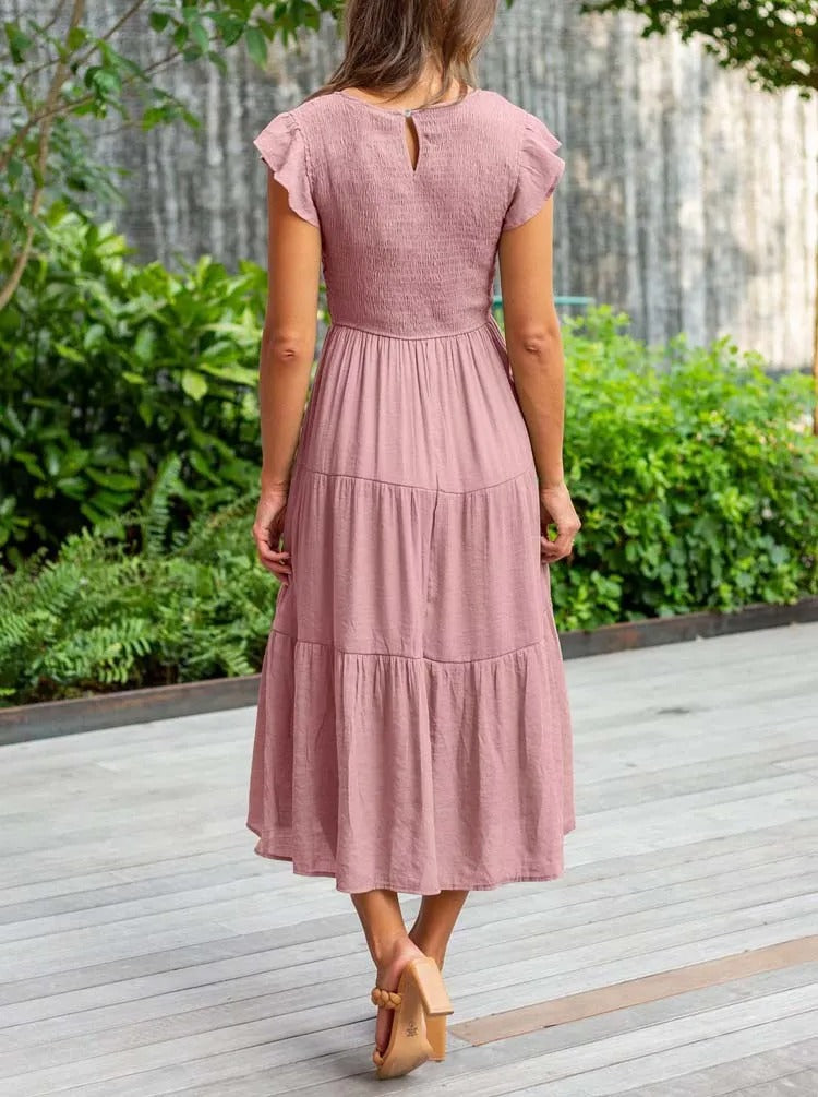 Elegantes sommerkleid: rüschendetails, taschen