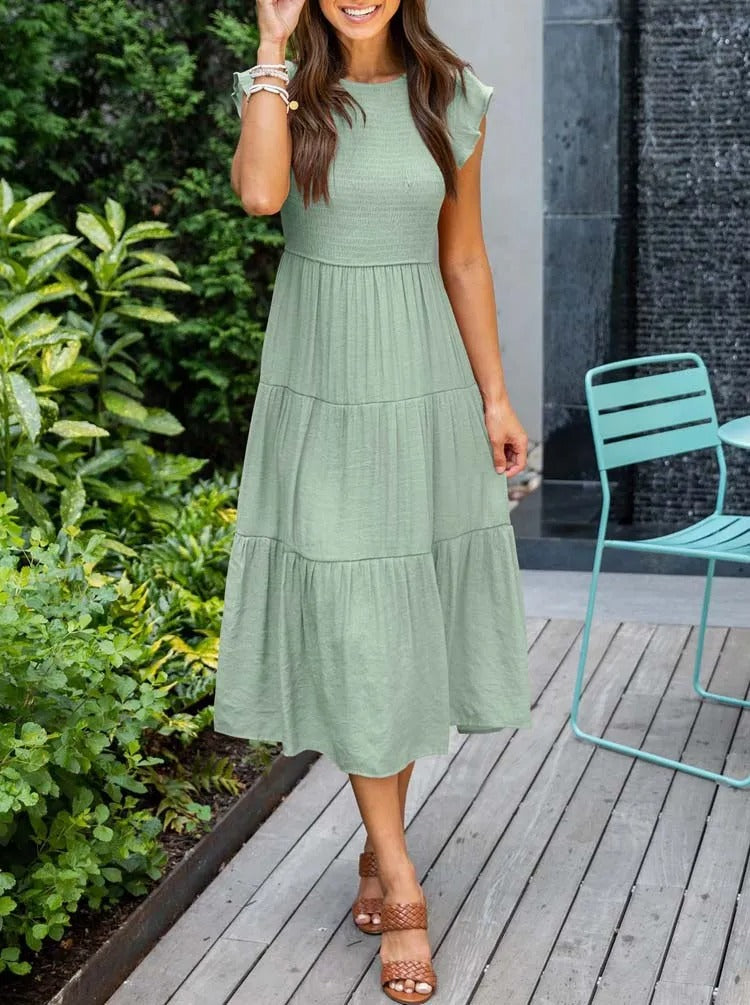Elegantes sommerkleid: rüschendetails, taschen