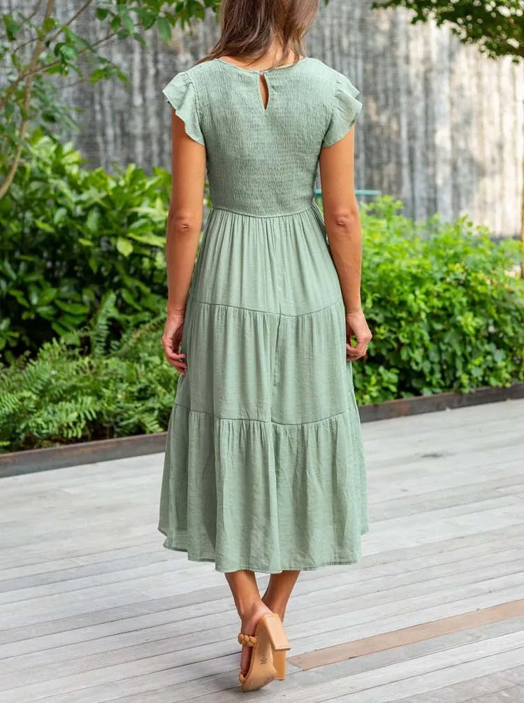 Elegantes sommerkleid: rüschendetails, taschen