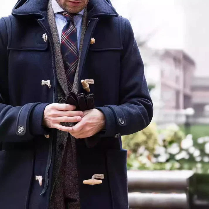 Oskar – woll-trenchcoat mit knebelverschluss und kapuze