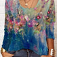 Lässiges t-shirt mit langen armeln und blumenprint mit rundhalsausschnitt und langen armeln