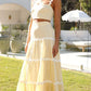 Ibrahimu | einfarbiges crop-top mit wellenartigem design und mehrlagigem rock-set