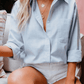 Schwarze Bluse mit Perlmuttknöpfen und Umlegekragen - Clara