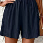 Schwarze Plissee Shorts - Lara