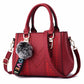 Julia - Schwarze Handtasche mit Charme